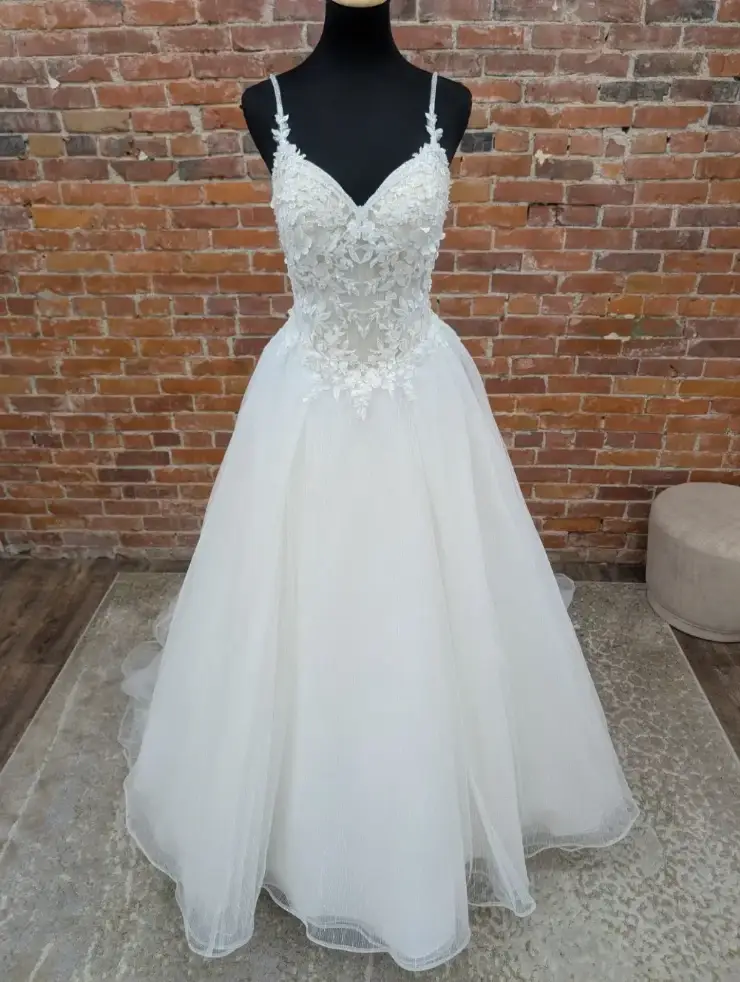image shows a sleeveless a-line bridal gown